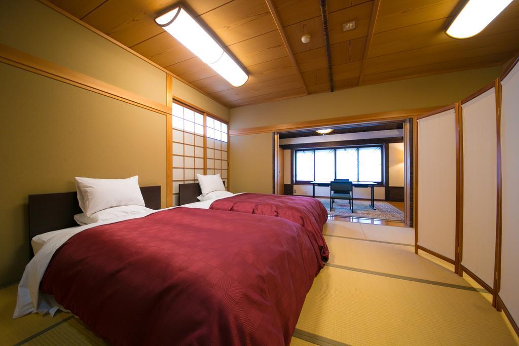 Hotel Ryotei Tanokura Yufu Exterior foto